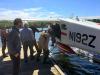 Bob Klaver steps from the float plane onto a dock at Hungry Jack Lake. Photo by Carl from Rockwood Lodge & Canoe Outfitters